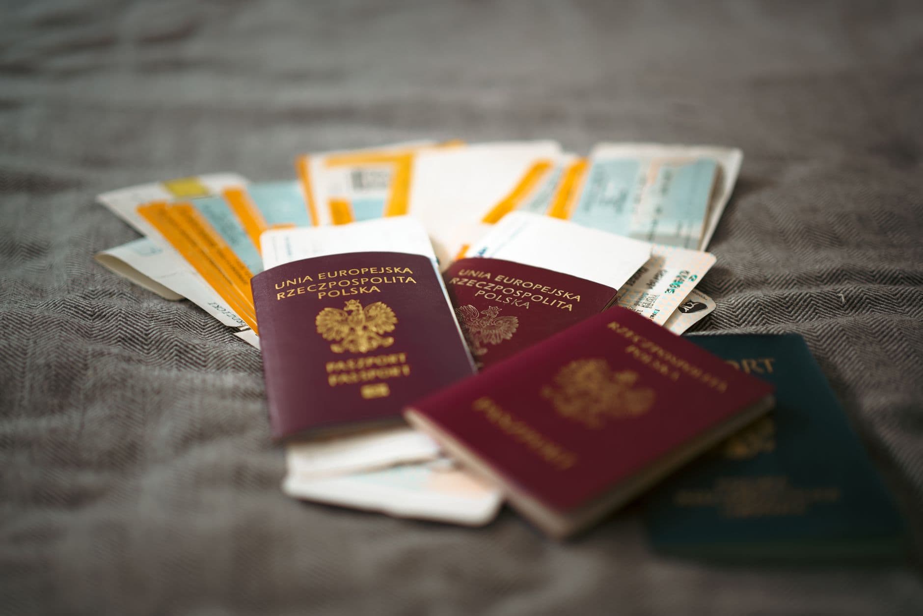 Close-up of passports and travel documents laid on a table