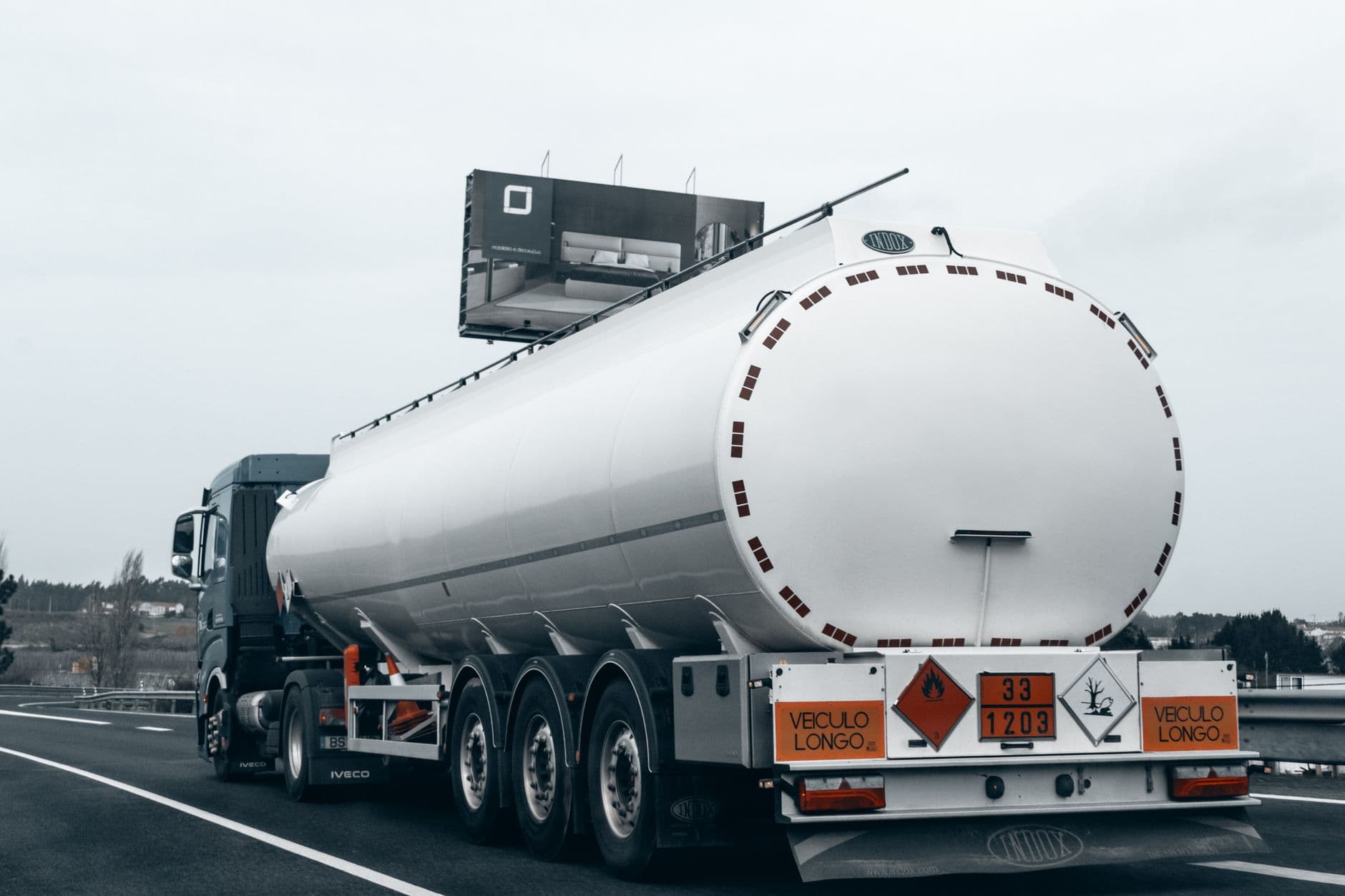 A large fuel tanker truck on a highway