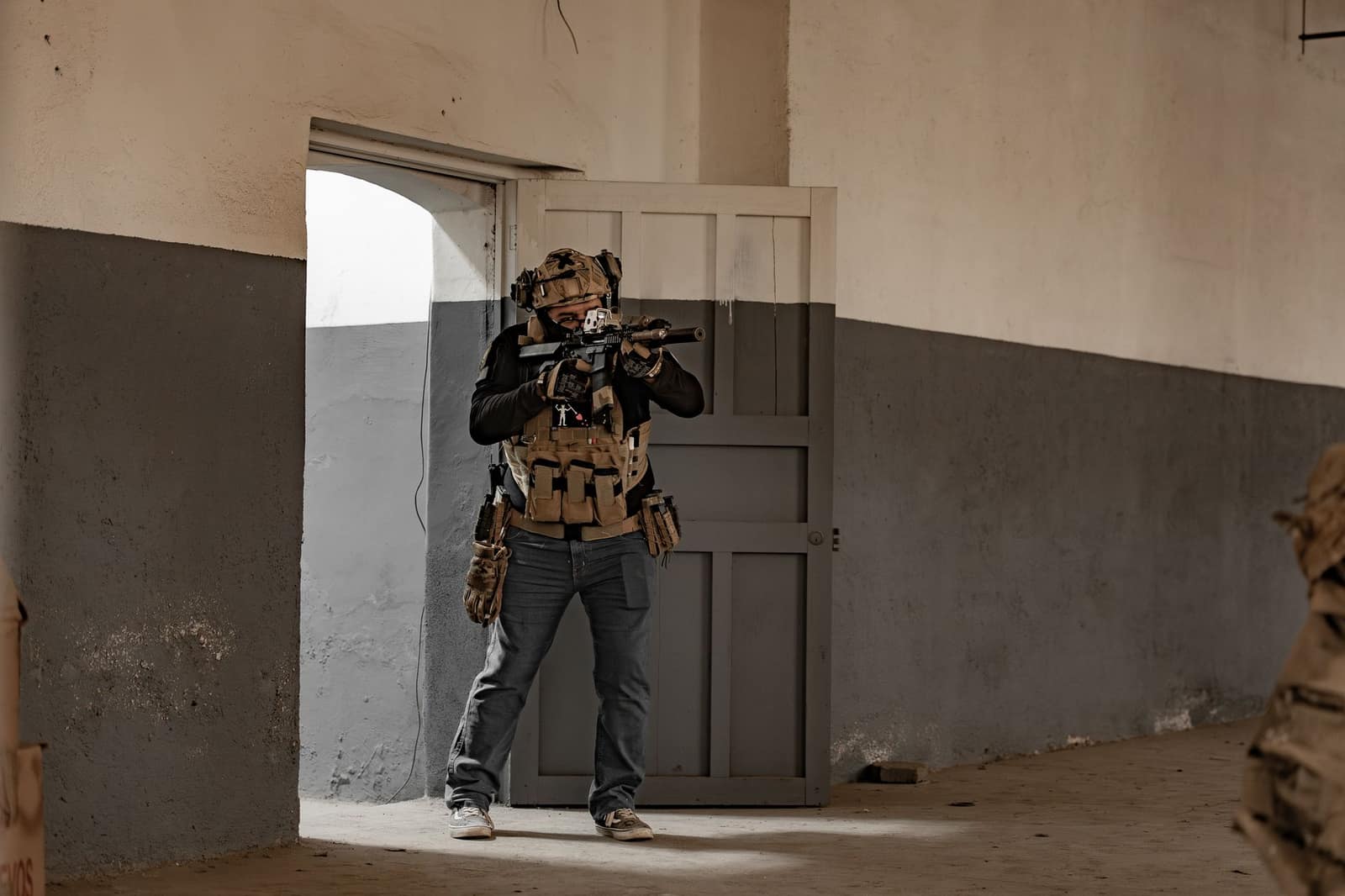 Armed security personnel in tactical gear during an operation exercise